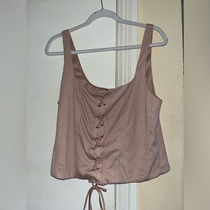 Tank top with tie in the front.